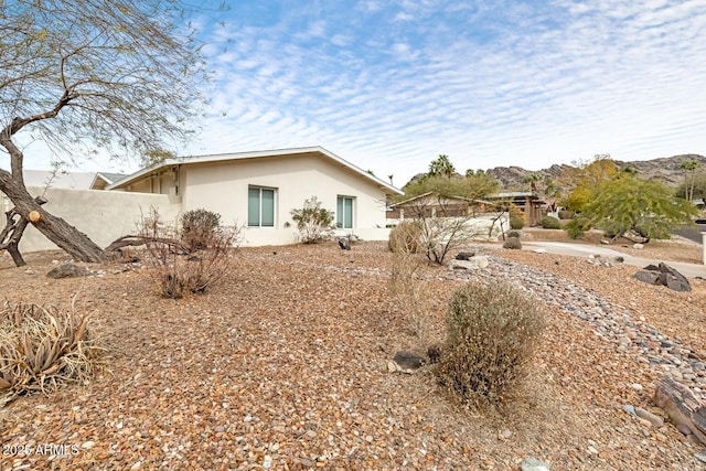 exterior space featuring stucco siding