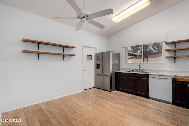 5135 E Evergreen St Unit 1166, Mesa, AZ 85205 - kitchen featuring dishwasher, stainless steel refrigerator with ice dispenser, open shelves, a sink, and light wood-style floors