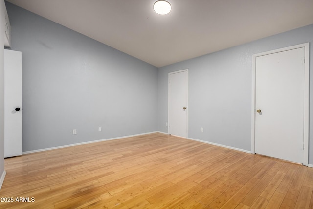 5135 E Evergreen St Unit 1166, Mesa, AZ 85205 - unfurnished bedroom with light wood-type flooring and baseboards
