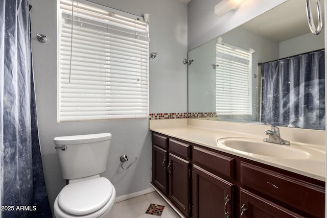 5135 E Evergreen St Unit 1166, Mesa, AZ 85205 - bathroom with vanity, tile patterned flooring, and toilet
