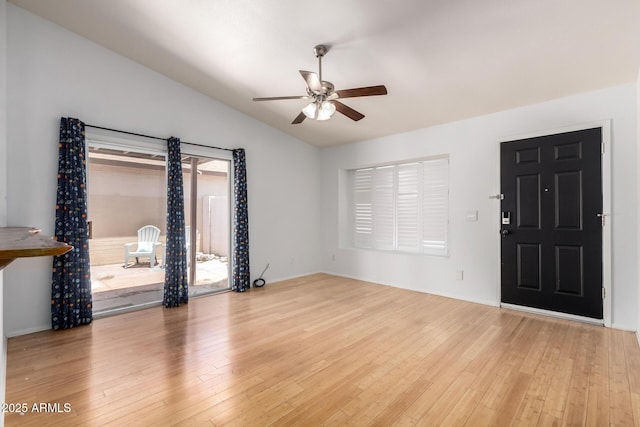 5135 E Evergreen St Unit 1166, Mesa, AZ 85205 - unfurnished living room with ceiling fan, vaulted ceiling, hardwood / wood-style floors, and baseboards
