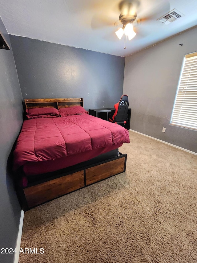 bedroom featuring carpet and ceiling fan