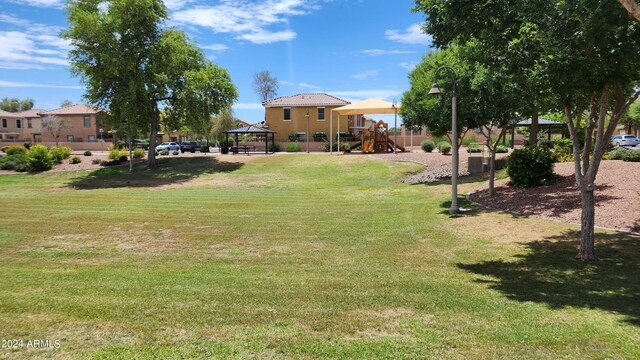 view of yard featuring a playground and a gazebo