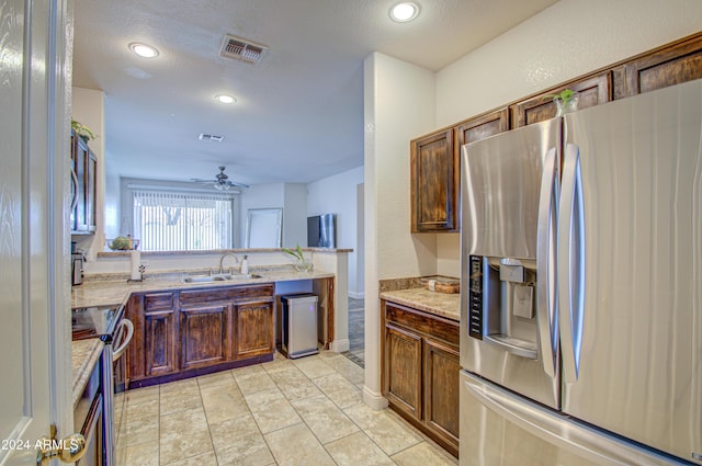 kitchen with a ceiling fan, visible vents, recessed lighting, a sink, and stainless steel appliances