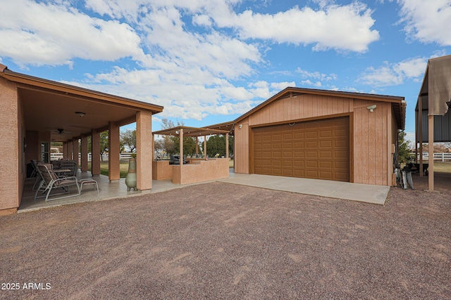 garage with ceiling fan