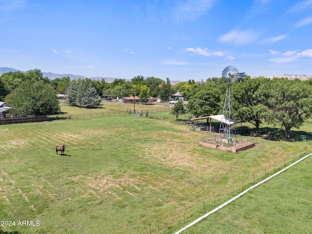 birds eye view of property featuring a rural view