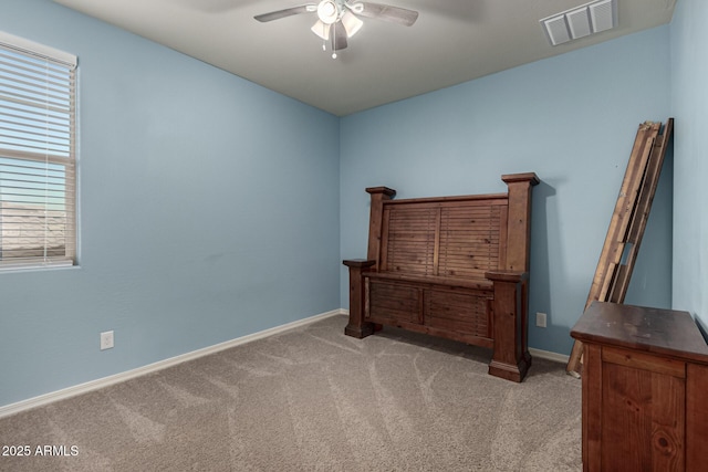 sitting room with light carpet and ceiling fan