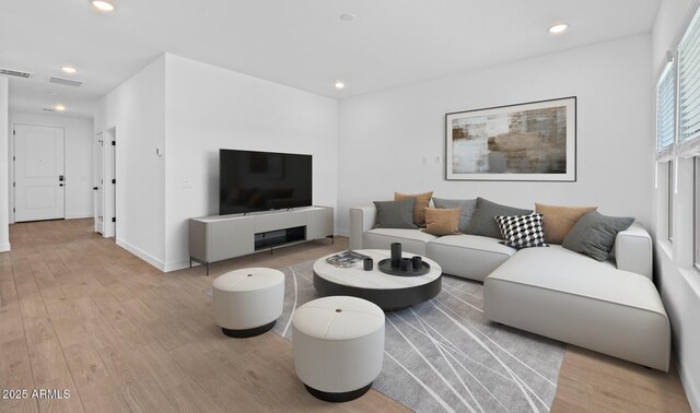 dining space featuring ceiling fan and hardwood / wood-style flooring