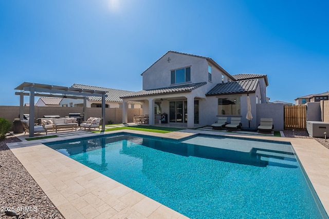 9645 E Ripple Dr, Mesa, AZ 85212 - back of house with an outdoor hangout area, a pergola, stucco siding, a patio, and a fenced backyard