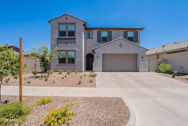 9645 E Ripple Dr, Mesa, AZ 85212 - mediterranean / spanish house with driveway, stucco siding, a tiled roof, and a garage