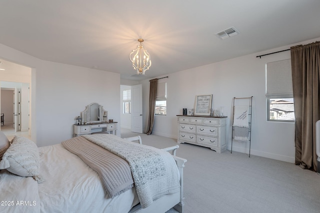 9645 E Ripple Dr, Mesa, AZ 85212 - bedroom featuring a chandelier, light carpet, and multiple windows