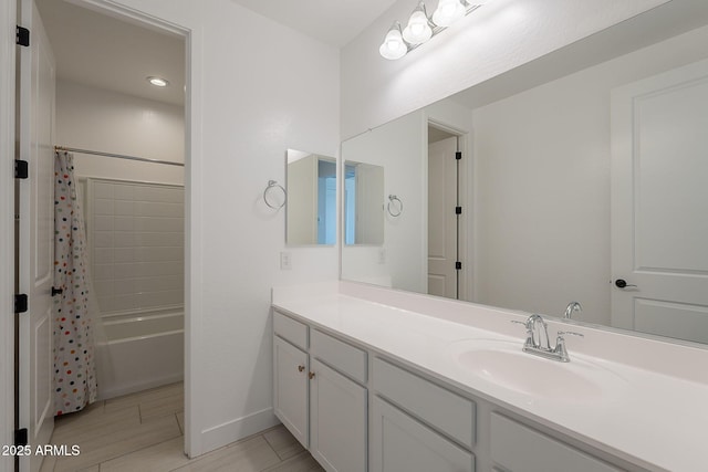 9645 E Ripple Dr, Mesa, AZ 85212 - full bath featuring vanity, shower / bath combo with shower curtain, and wood finished floors