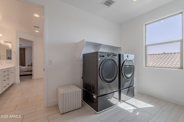 9645 E Ripple Dr, Mesa, AZ 85212 - laundry room featuring washing machine and clothes dryer and recessed lighting