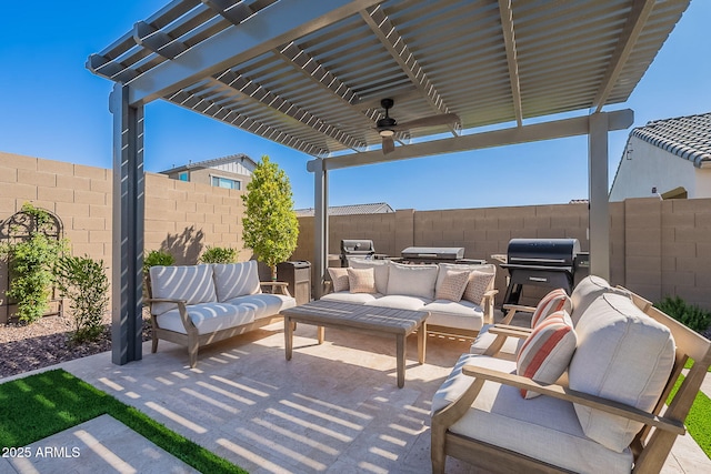 9645 E Ripple Dr, Mesa, AZ 85212 - fenced backyard featuring an outdoor living space, a patio, a pergola, ceiling fan, and grilling area