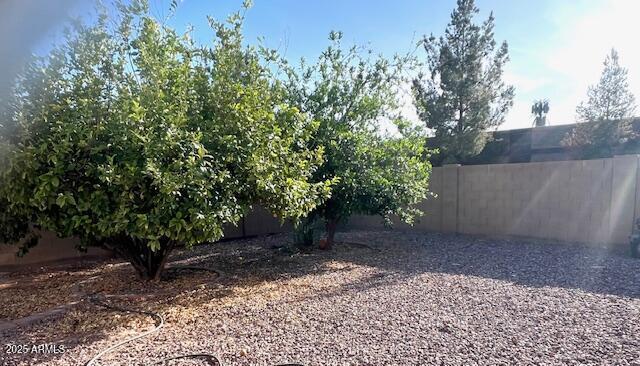 view of yard featuring fence
