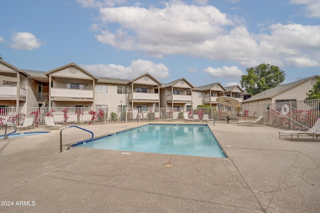 view of pool featuring a patio area