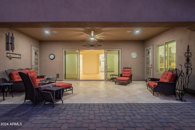 view of patio featuring ceiling fan