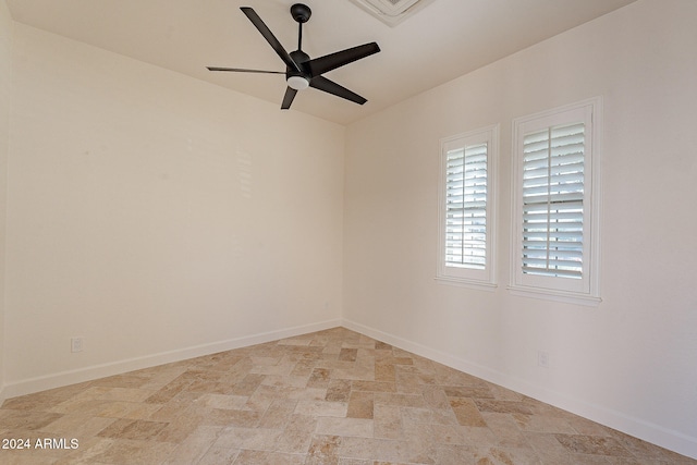 empty room featuring ceiling fan