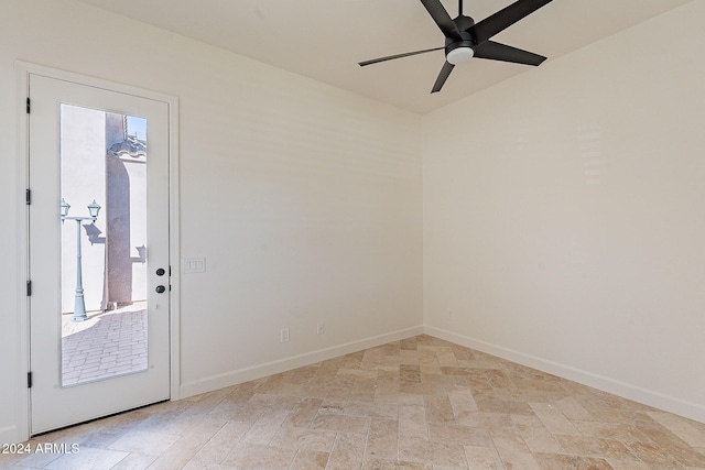 spare room featuring ceiling fan