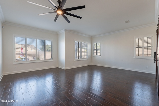 empty room with dark wood-type flooring, ceiling fan, and crown molding