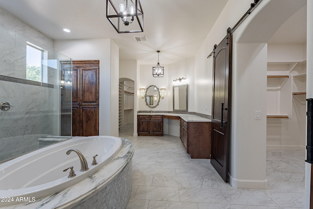 bathroom featuring shower with separate bathtub and vanity