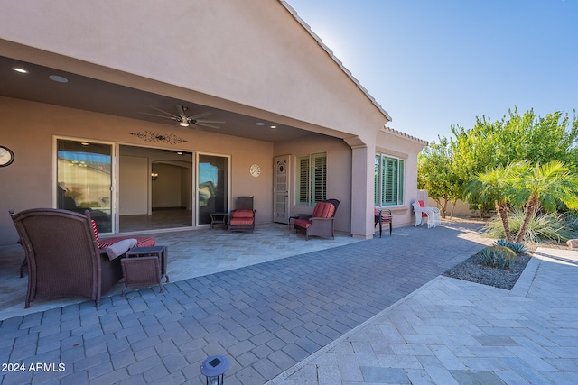 view of patio / terrace featuring ceiling fan