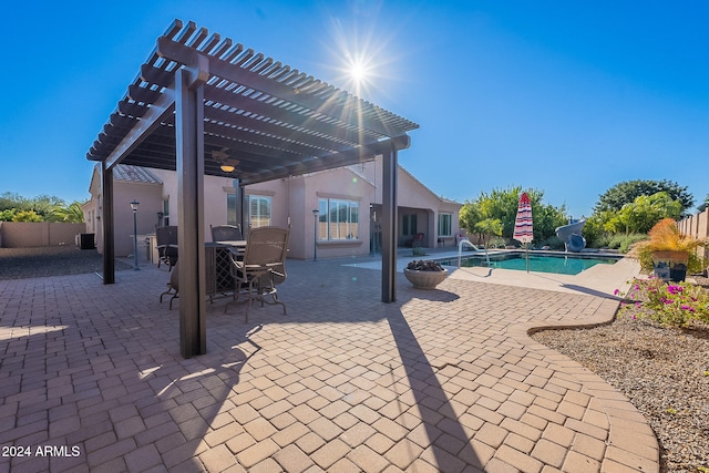 view of pool featuring a pergola and a patio area