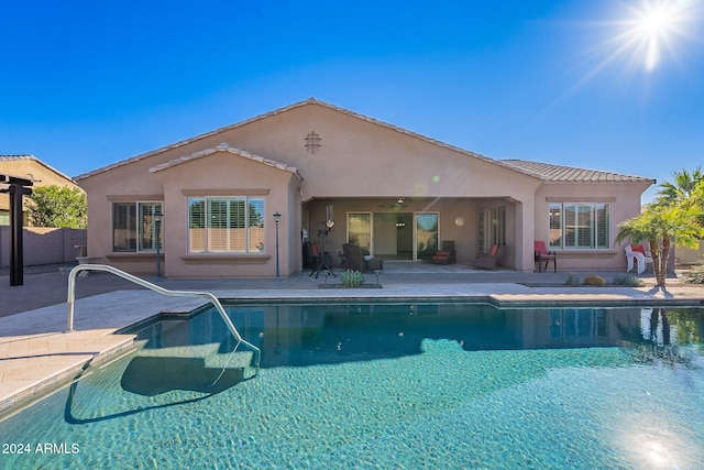 view of swimming pool with a patio area