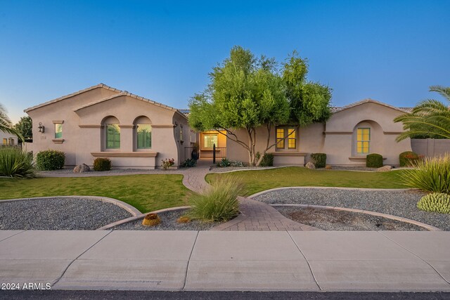 view of front of house with a front lawn