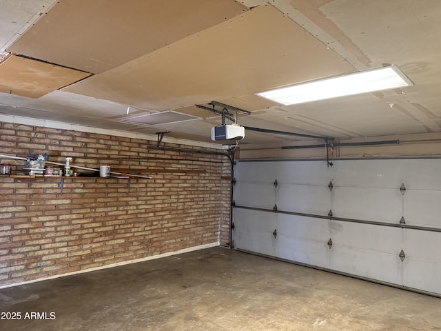 garage featuring a garage door opener