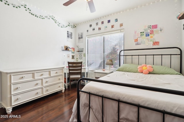 bedroom featuring ceiling fan and dark hardwood / wood-style flooring