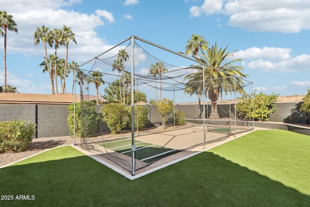 view of home's community featuring tennis court and a lawn