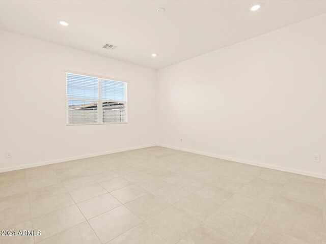 view of tiled spare room