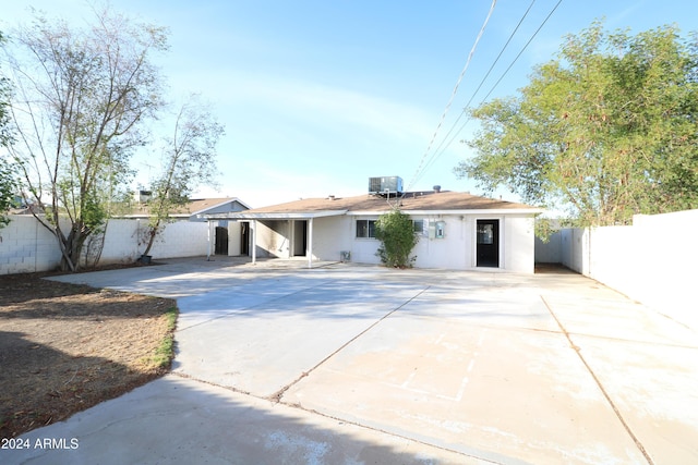 3615 W San Juan Ave, Phoenix, AZ 85019 - view of front facade with a fenced backyard, driveway, stucco siding, and a patio