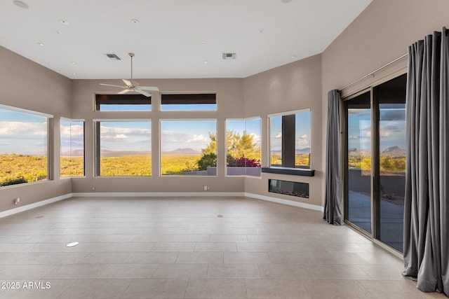 16814 N Boulder Dr, Fountain Hills, AZ 85268 - unfurnished sunroom featuring tile patterned floors and baseboards