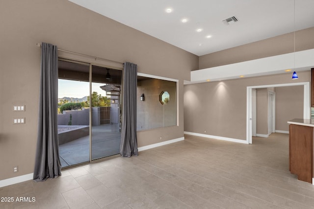 16814 N Boulder Dr, Fountain Hills, AZ 85268 - spare room featuring baseboards and recessed lighting