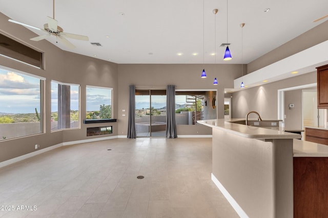 16814 N Boulder Dr, Fountain Hills, AZ 85268 - kitchen with open floor plan, healthy amount of natural light, light countertops, pendant lighting, and recessed lighting