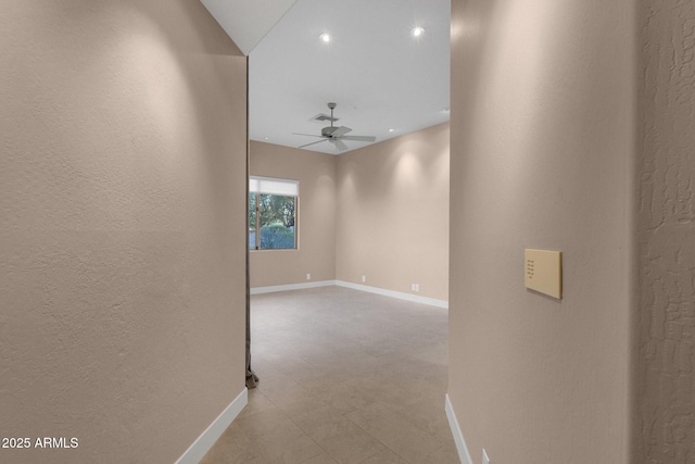 16814 N Boulder Dr, Fountain Hills, AZ 85268 - corridor with baseboards, recessed lighting, a textured wall, and light floors