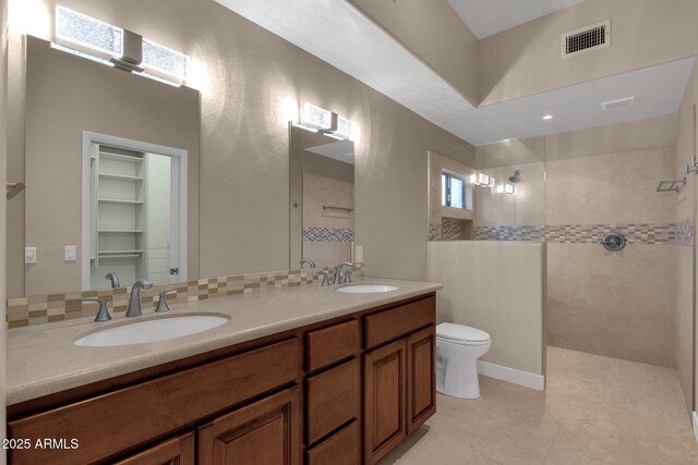 16814 N Boulder Dr, Fountain Hills, AZ 85268 - full bathroom with a walk in shower, toilet, double vanity, and tile patterned flooring