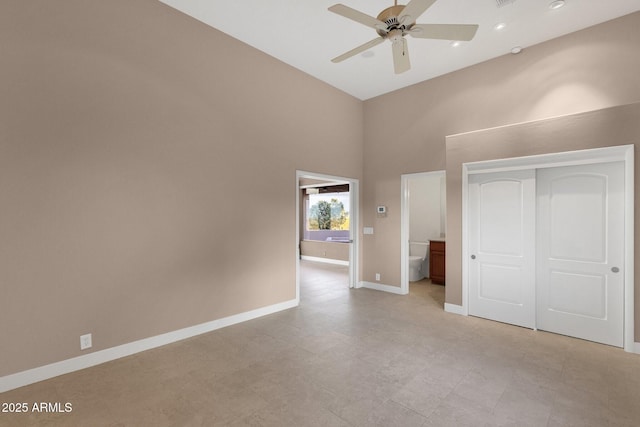 16814 N Boulder Dr, Fountain Hills, AZ 85268 - unfurnished bedroom with a high ceiling, a closet, baseboards, recessed lighting, and a ceiling fan
