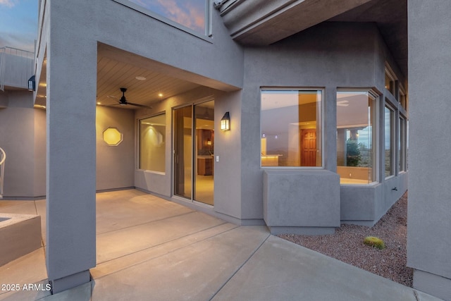 16814 N Boulder Dr, Fountain Hills, AZ 85268 - view of exterior entry with a patio, stucco siding, and ceiling fan