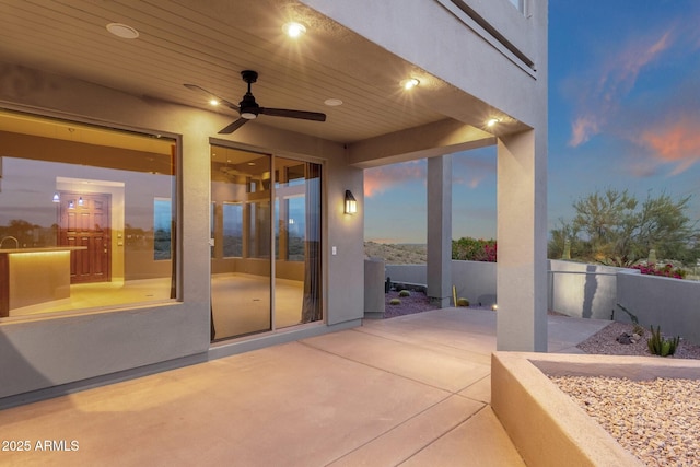 16814 N Boulder Dr, Fountain Hills, AZ 85268 - patio terrace at dusk featuring a ceiling fan