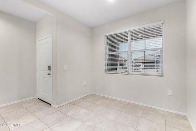 view of tiled empty room