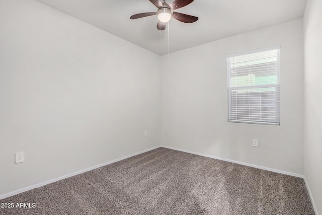 carpeted empty room with ceiling fan