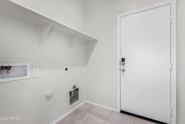 washroom with gas dryer hookup, hookup for an electric dryer, light tile patterned floors, and washer hookup