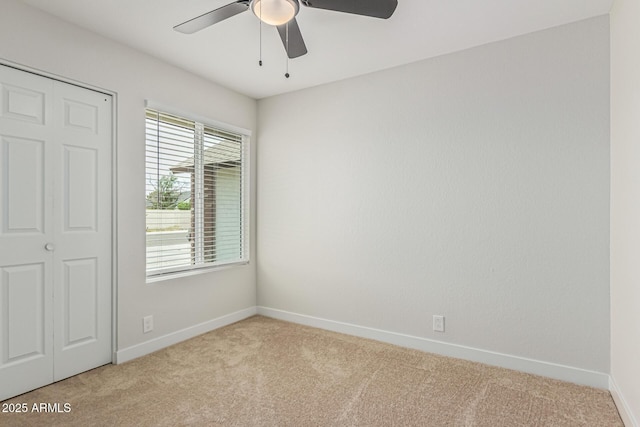 11021 N 55th Dr, Glendale, AZ 85304 - unfurnished bedroom with carpet flooring, baseboards, and ceiling fan