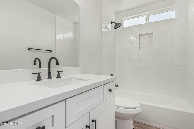 11021 N 55th Dr, Glendale, AZ 85304 - bathroom with vanity, toilet, wood finished floors, and shower / bathtub combination