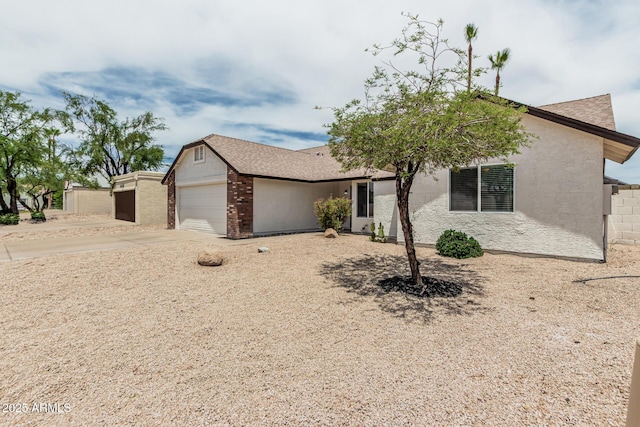 11021 N 55th Dr, Glendale, AZ 85304 - view of front of property featuring a garage, concrete driveway, and stucco siding