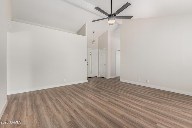 11021 N 55th Dr, Glendale, AZ 85304 - unfurnished room with wood finished floors, high vaulted ceiling, baseboards, and a ceiling fan