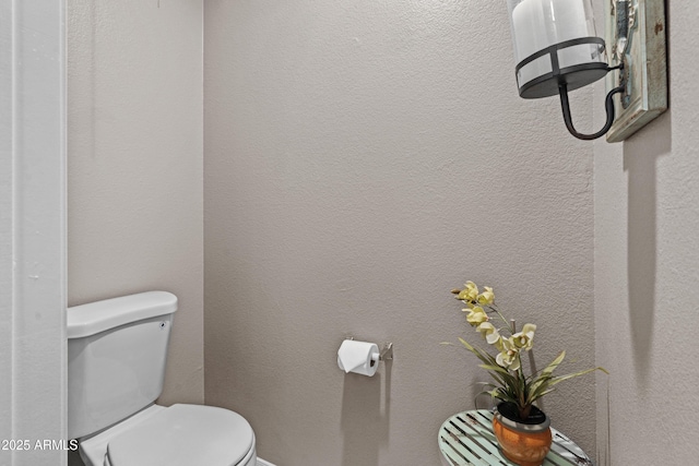 bathroom featuring toilet